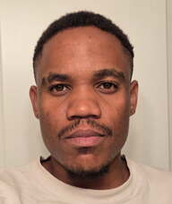 Book an Appointment with Kamarl Kawenga for Hair